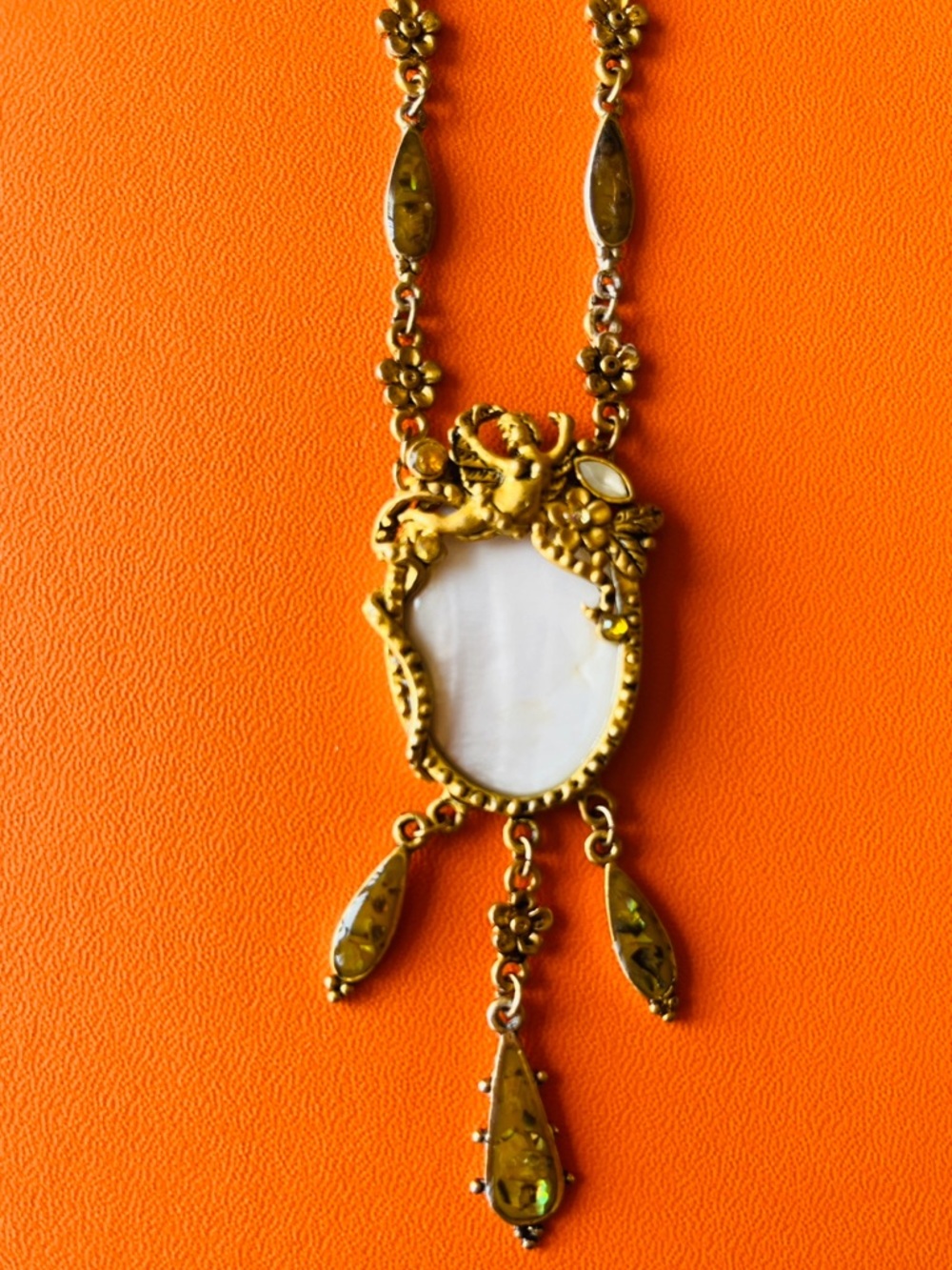Vintage Mother-of-pearl necklace with central cherub 16”